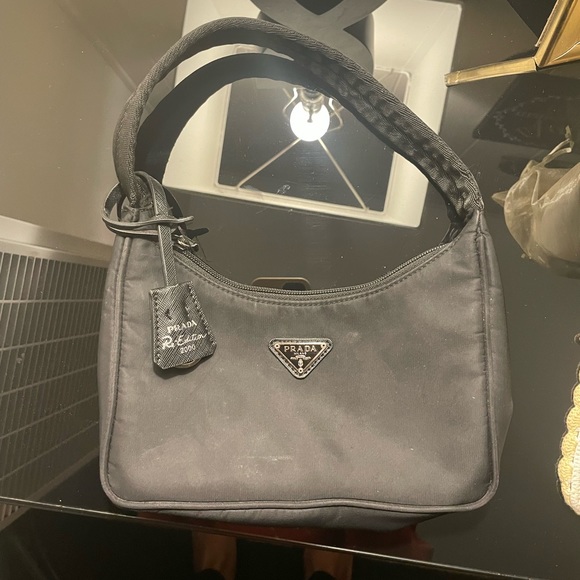 Prada it’s small it’s black - Picture 2 of 5